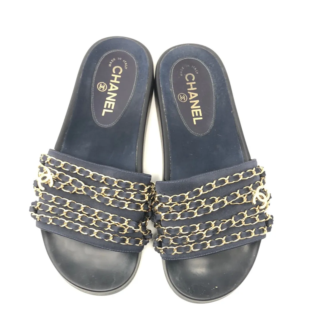 Chanel navy Tropiconic slides with gold chain and cc