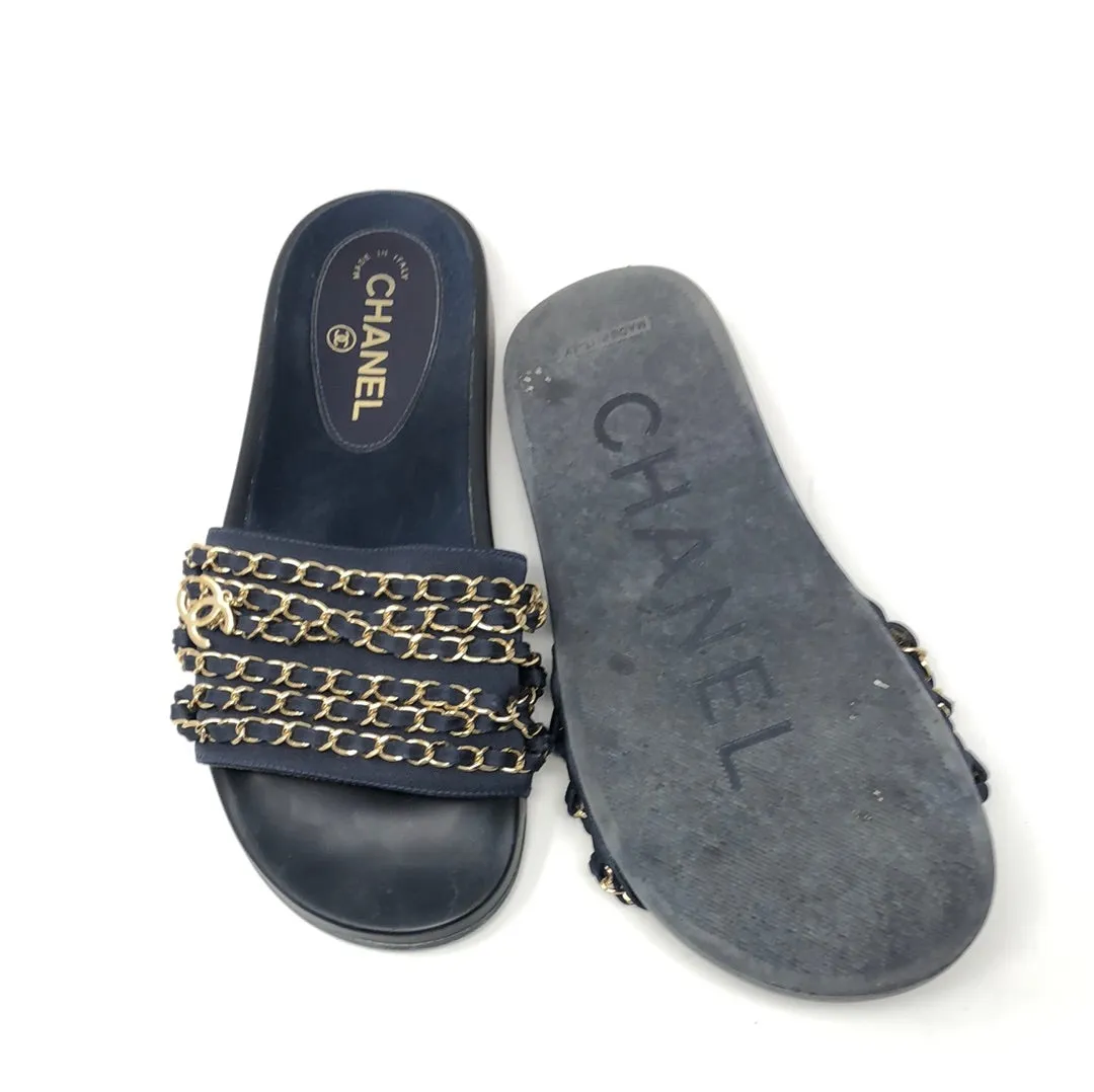 Chanel navy Tropiconic slides with gold chain and cc